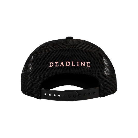 The back profile of a Black mesh cap trucker hat with the "DEADLINE" text on the back in Pink letters.